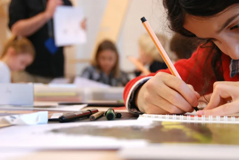 Children participating in a drawing workshop at Mudam.