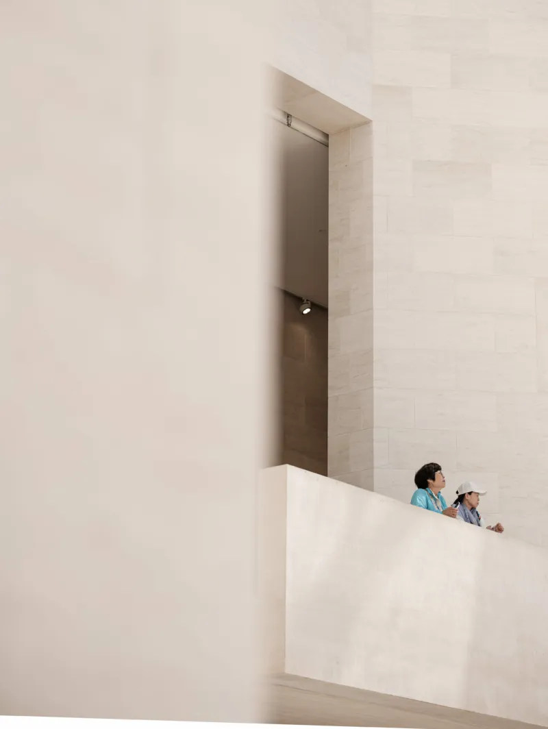 People standing on the balcony in the Mudam Grand Hall.