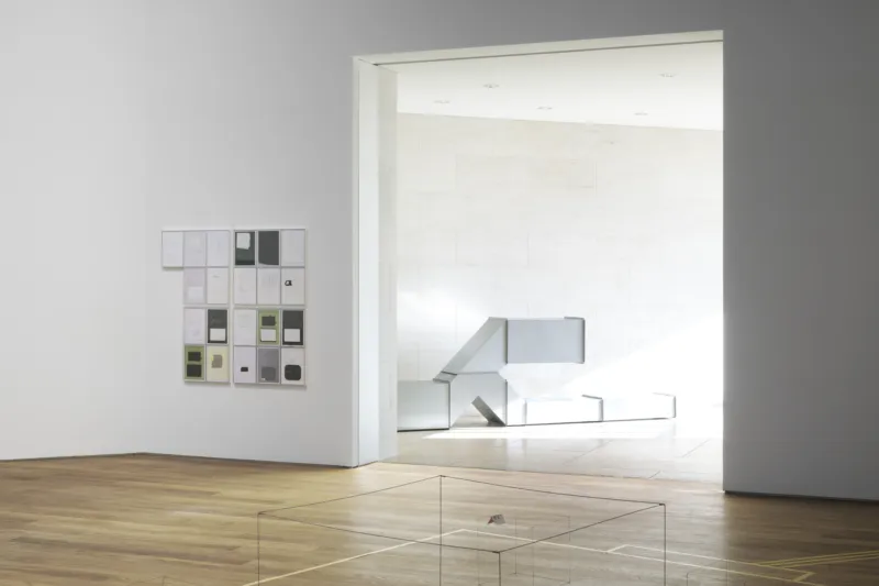 Joëlle Tuerlinckx, ‘Collages THEORY OF WALKING - série ‘TOUT CE QUI N'EST / ALLES WAT NIET IS / ALL THAT IS NOT’, 1996-2012. Courtesy of the artist, Galerie nächst St. Stephan Rosemarie Schwarzwälder and Galerie Nagel Draxler Berlin / Cologne. Donation 2023 – Gaby and Wilhelm Schürmann with the support of the members of the Cercle des collectionneurs du Mudam Luxembourg + Charlotte Posenenske, ‘Vierkantrohre Serie D’, 1967-2019. Collection Mudam Luxembourg. View of the exhibition ‘Radio Luxembourg: Echoes across borders’, Mudam Luxembourg. Photo: Mareike Tocha © Mudam Luxembourg