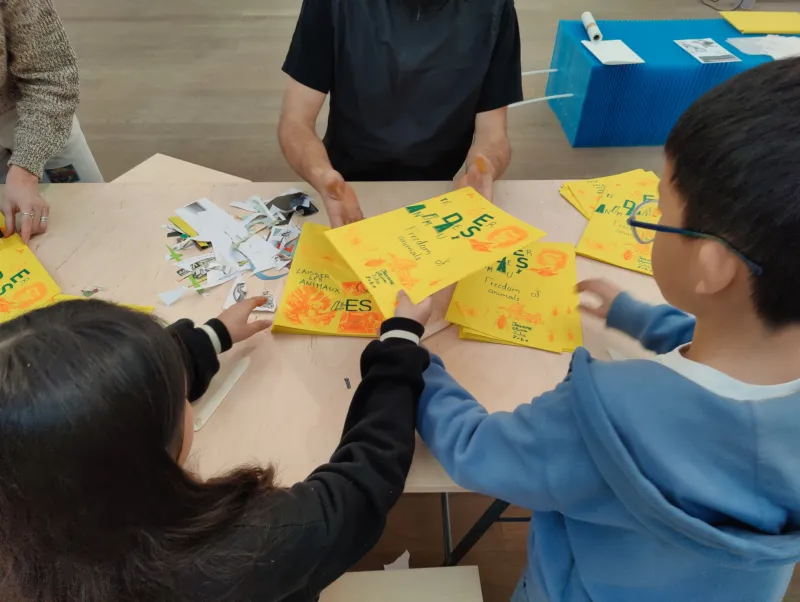 Children participating in a collage workshop at Mudam.