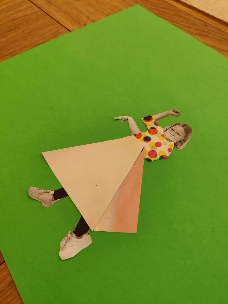 A child's collage of them self in geometric clothing.