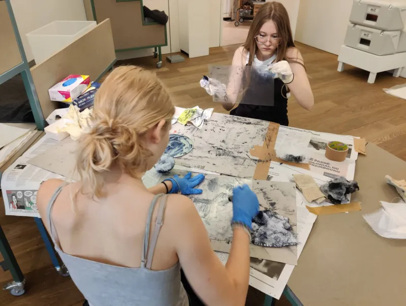 Young people participating in a print workshop at Mudam