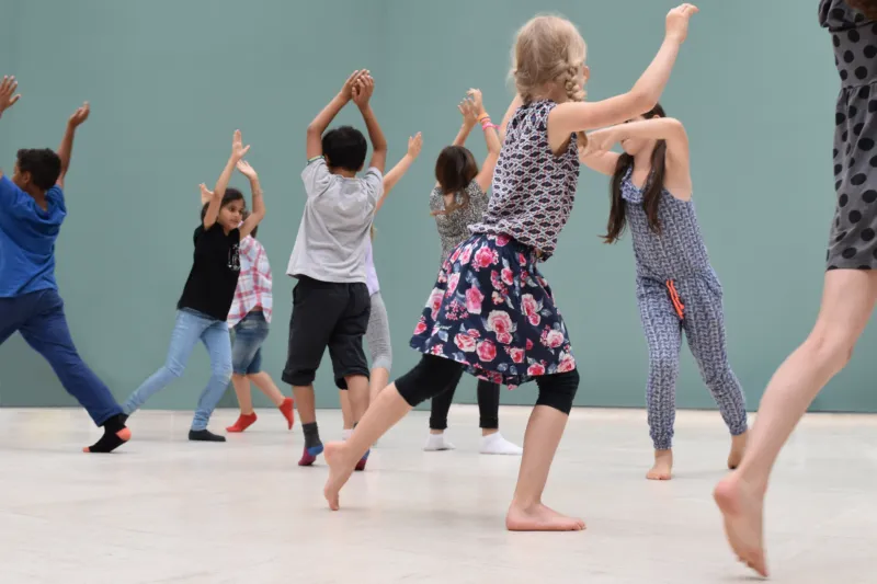 Children dancing in the galleries of Mudam.