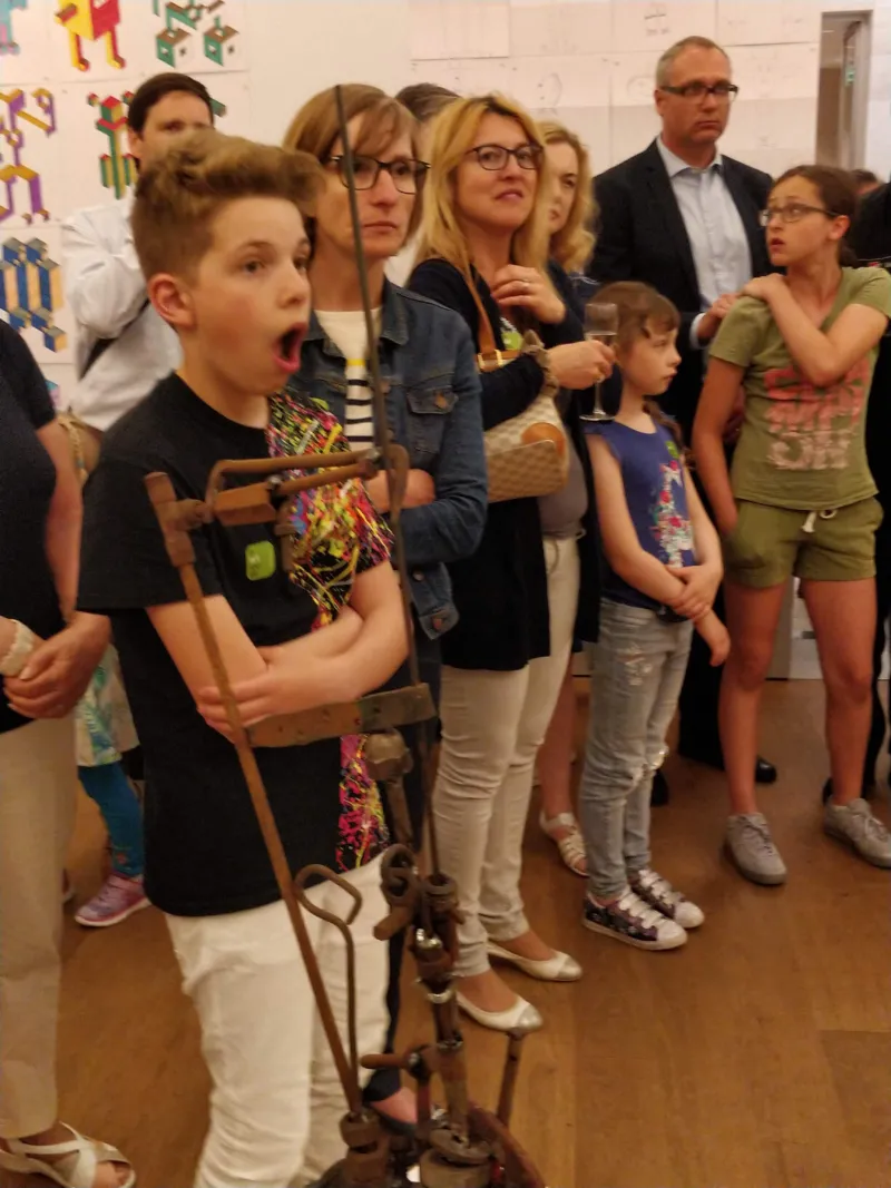 Children and their parents visiting Mudam.