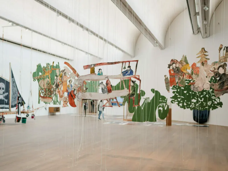 Anna Boghiguian, ‘The Silk Road’, 2020–21. 12 cut outs on Khadi Rag paper 400g, pencil, encaustic (bee wax and pigment), silk thread, acrylic mirror plates. 24 drawings on paper. Courtesy of the artist. View of the exhibition ‘A Model’, Mudam Luxembourg © Photo: Marion Dessard | Mudam Luxembourg