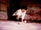 Yoko Matsumoto painting in her studio, Ongata, Hachioji, Tokyo, in 1982. 
© The artist. Courtesy Hino Gallery and White Cube
Photo: © Mikio Kubota